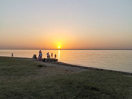 Solnedgang over Thorness Bay