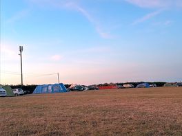 Campsite field at sunset